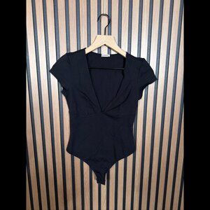 Free People Bodysuit XS Women’s Black One Piece Cute Top Deep V Neck